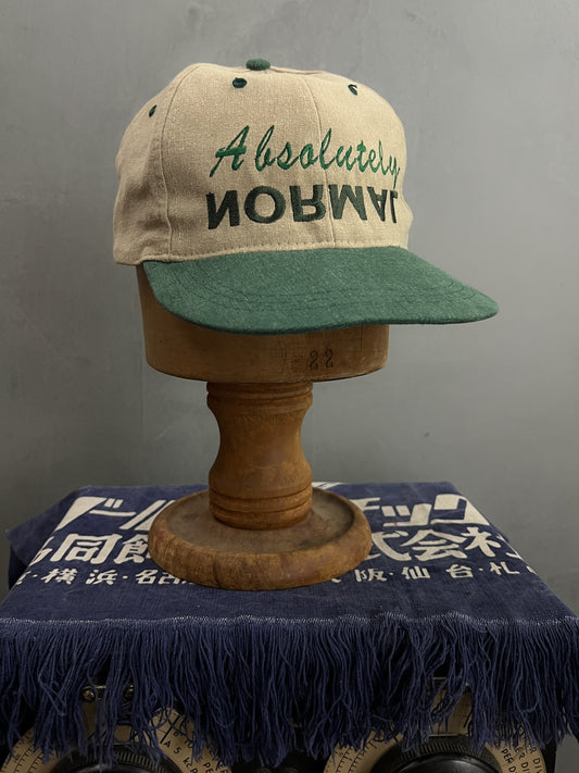 Absolutely Normal Cap
